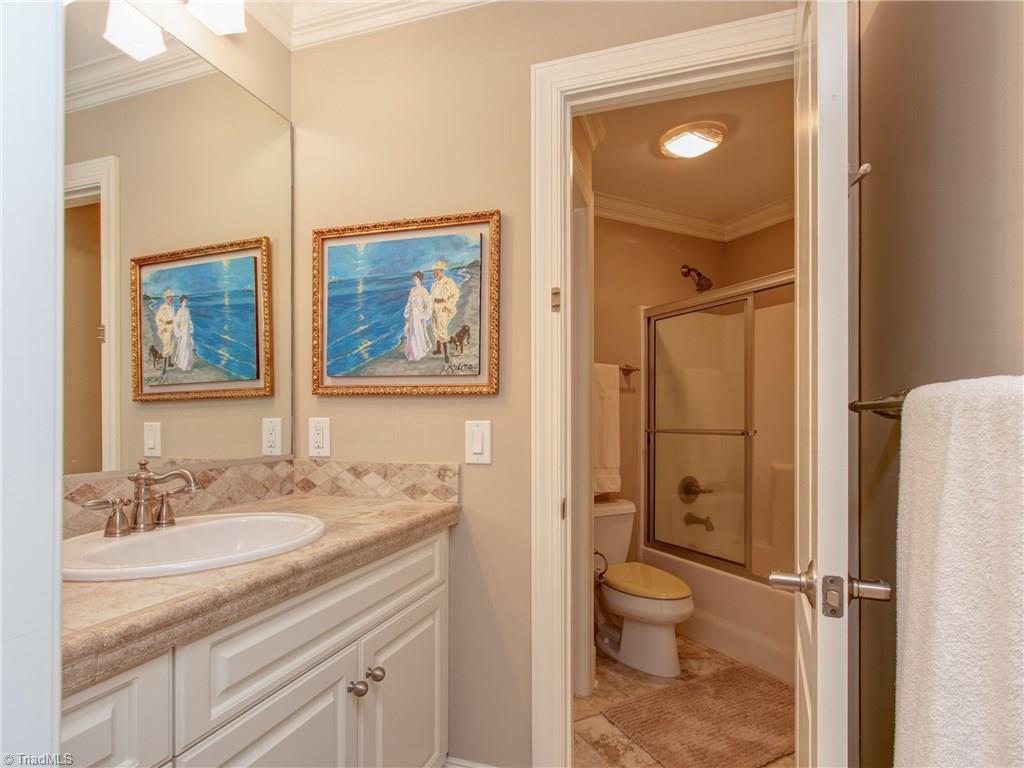 8404 Oakchester Court Oak Ridge, NC 27310 - Photo 21 of 30 Jack and Jill bath connecting bedroom no. 2 and 3.