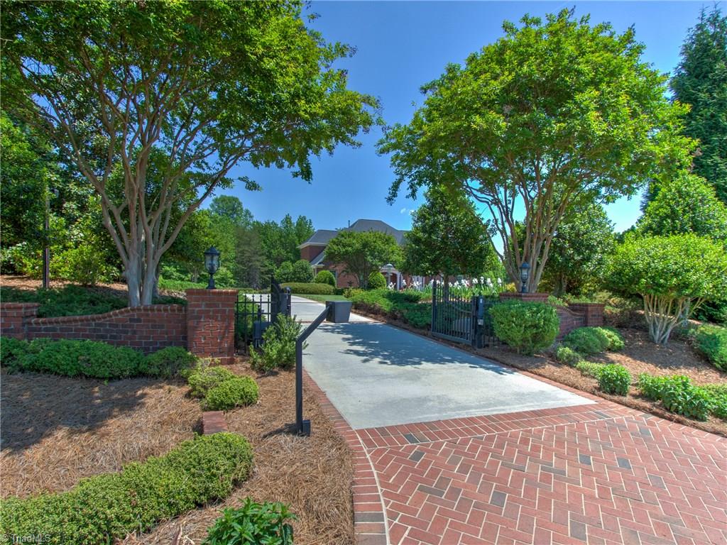 8404 Oakchester Court Oak Ridge, NC 27310 - Photo 30 of 30 Wrought iron electric gated entrance with security cameras.