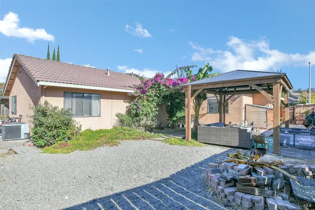 an aerial view of a house with a swimming pool