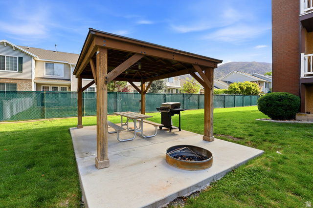 88 West 50 South, Unit P10 Centerville, UT 84014 - Photo 19 of 20 View of patio with a gazebo, grilling area, a fire pit, and a mountain view