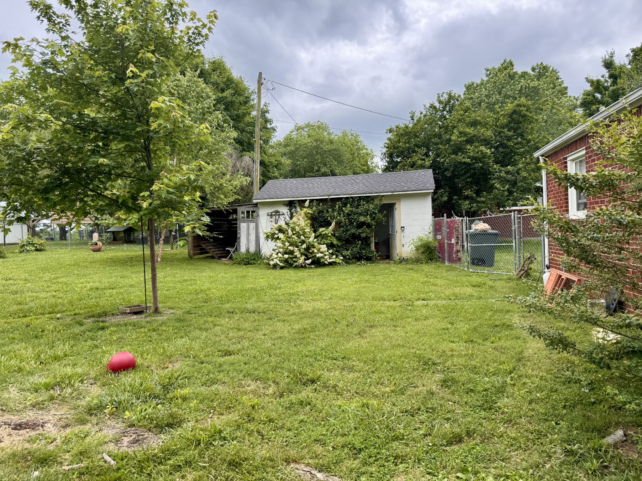 326 Jackson Road Portland, TN 37148 - Photo 25 of 34 a front view of a house with garden
