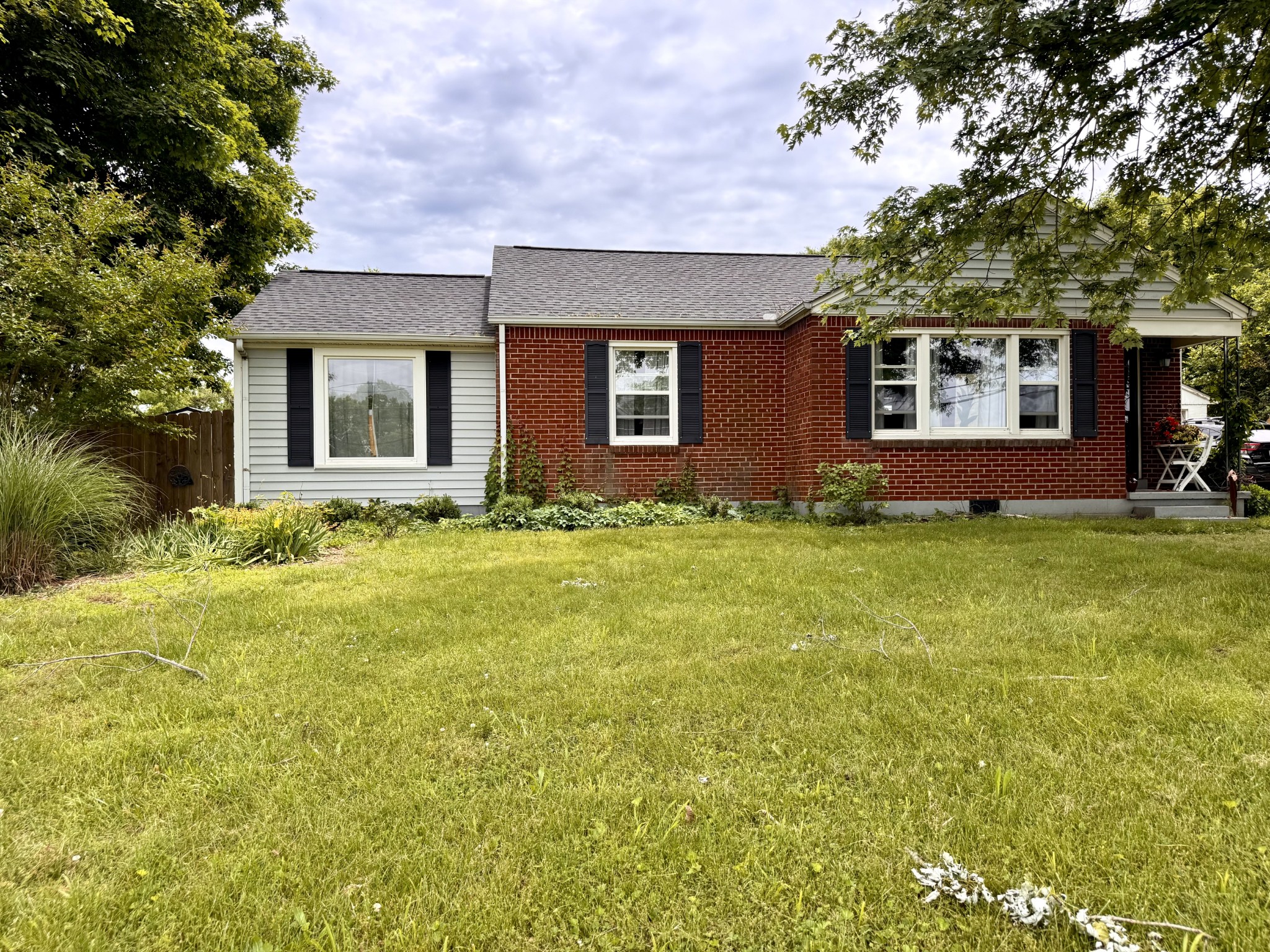 326 Jackson Road Portland, TN 37148 - Photo 3 of 34 a front view of house with yard and trees around