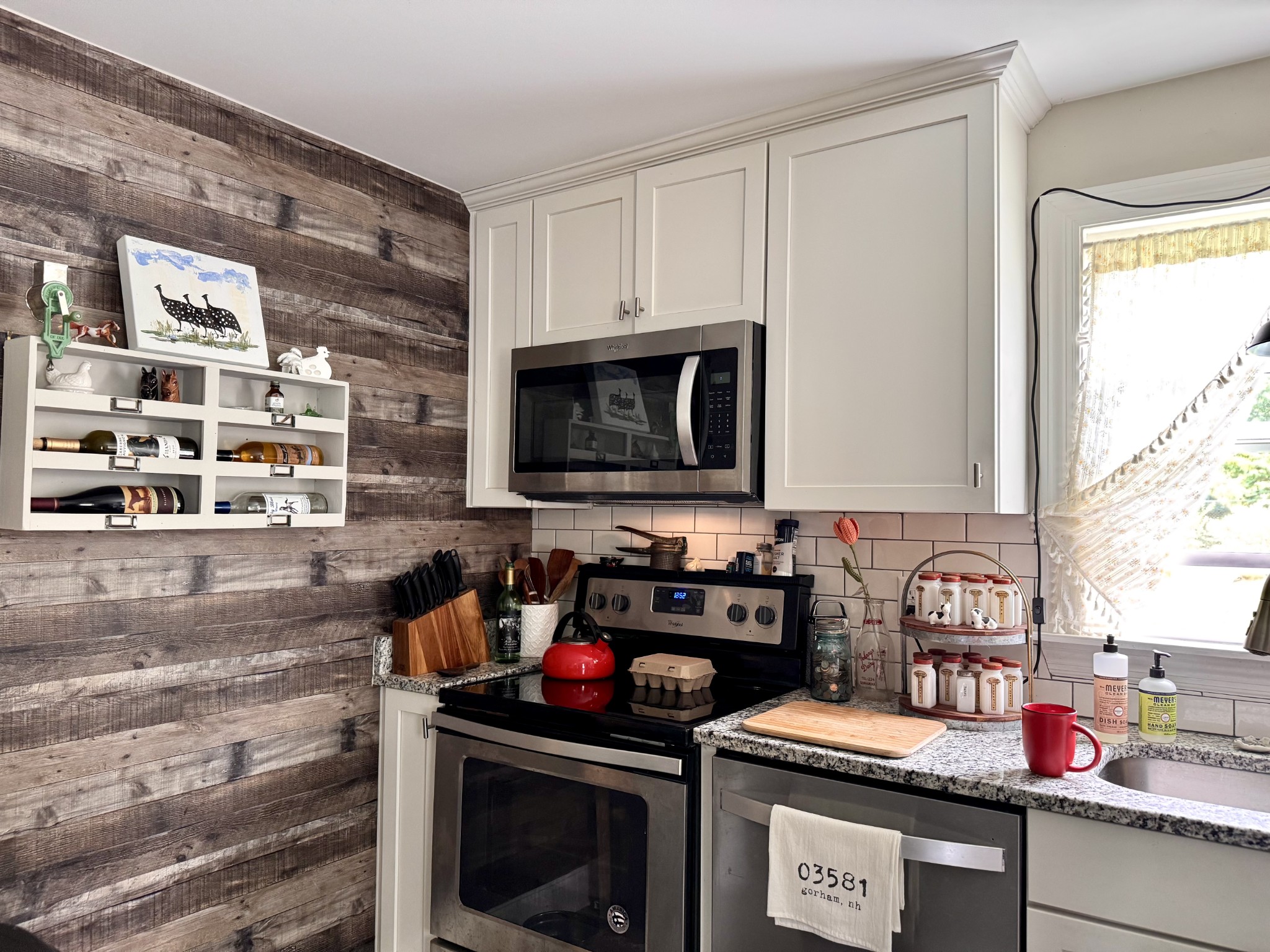 326 Jackson Road Portland, TN 37148 - Photo 8 of 34 a kitchen with a stove and a microwave