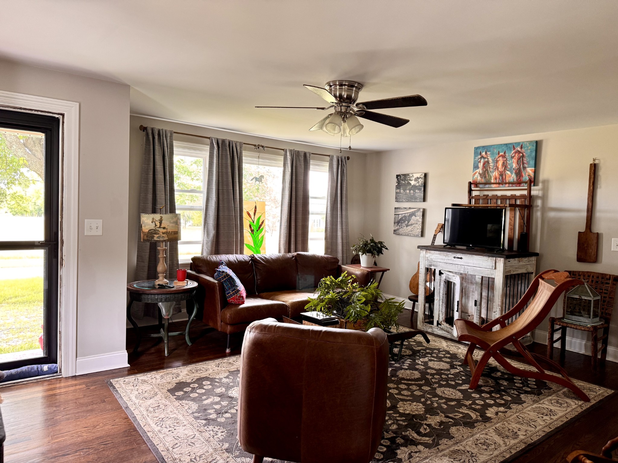 326 Jackson Road Portland, TN 37148 - Photo 10 of 34 a living room with furniture and a flat screen tv