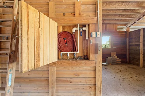a view of a yard with an outdoor space