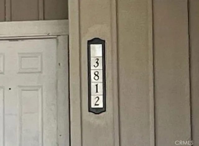 a view of multiple houses with a street