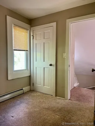 a bathroom with a toilet and a sink