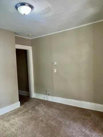 an empty room with an entryway