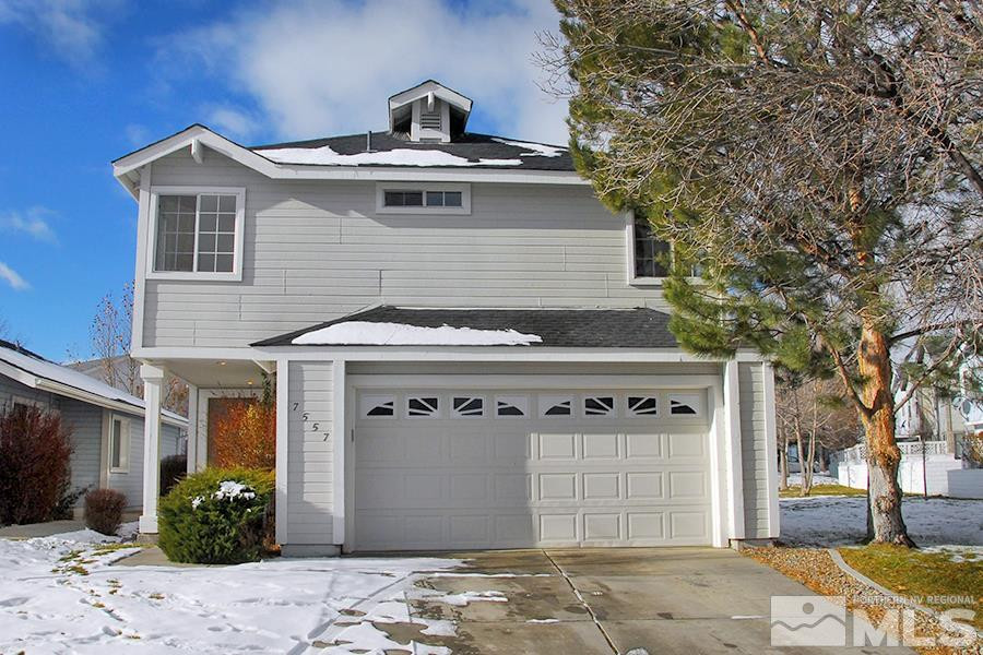 7557 Wheeldale Circle Reno, NV 89511 - Photo 1 of 1 a front view of a house with a garden