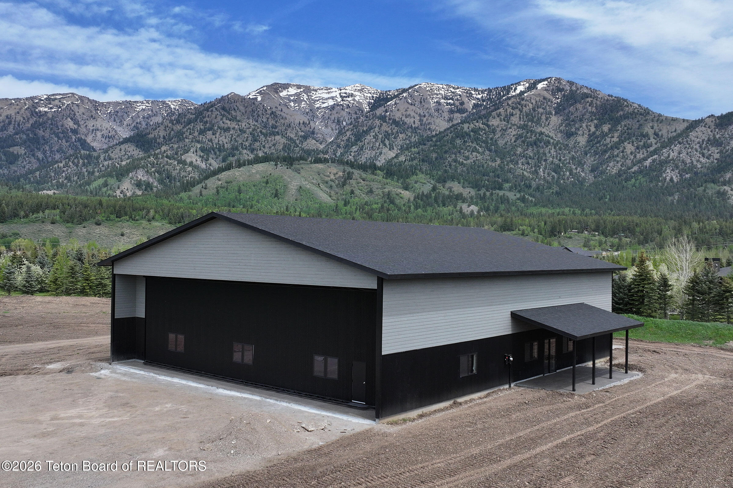 331 Funk Fairway Alpine, WY 83128 - Photo 2 of 12 Lot_9_Refuge_West_Exterior_NE_C_lo