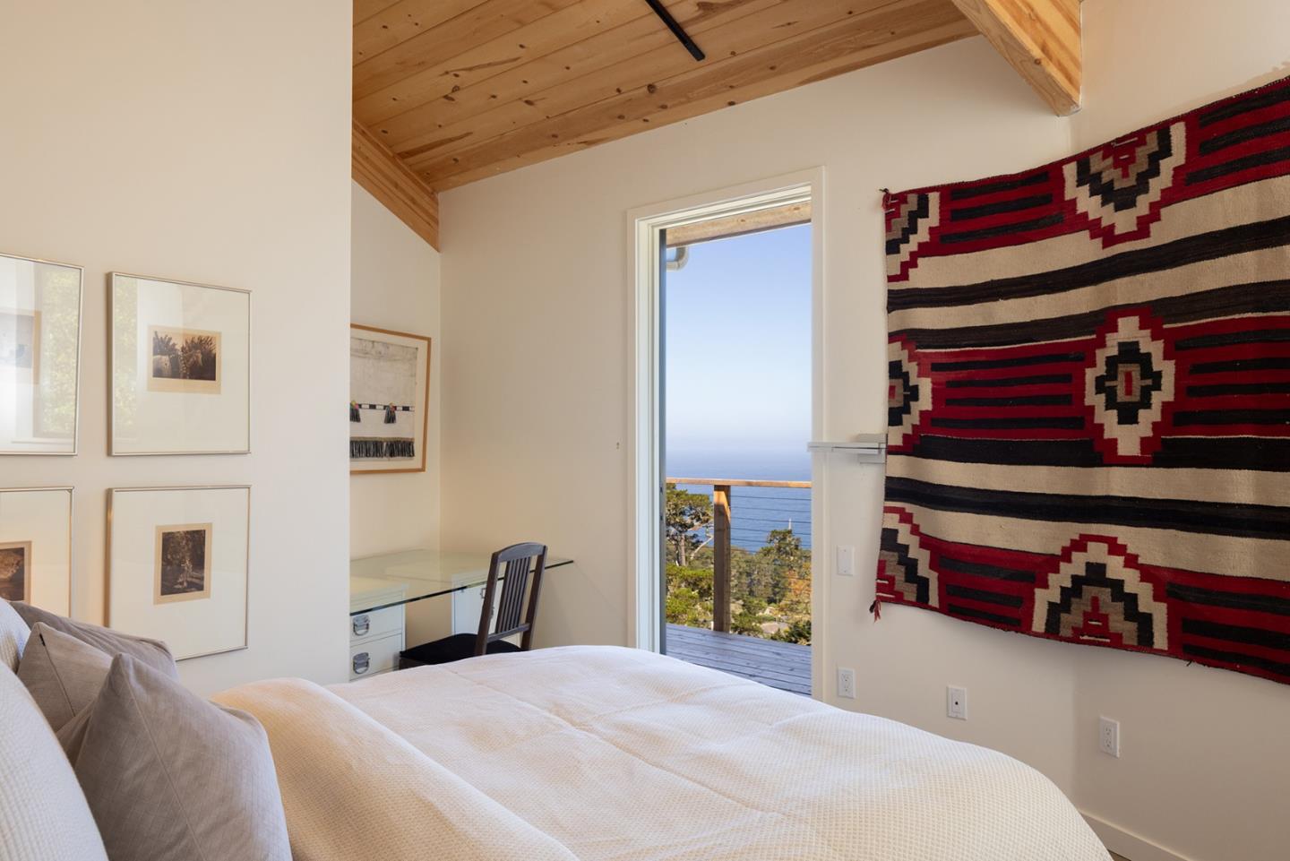 209 Crest Road Carmel, CA 93923 - Photo 12 of 35 a bedroom with a bed and a lamp on the dresser