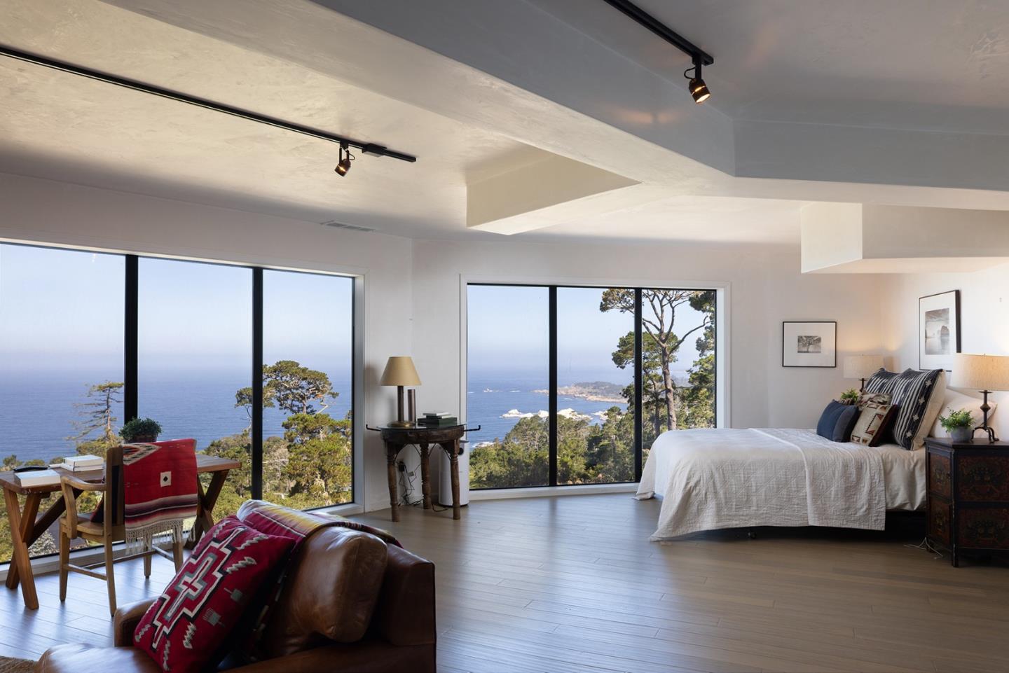 209 Crest Road Carmel, CA 93923 - Photo 16 of 35 a bedroom with furniture and large windows