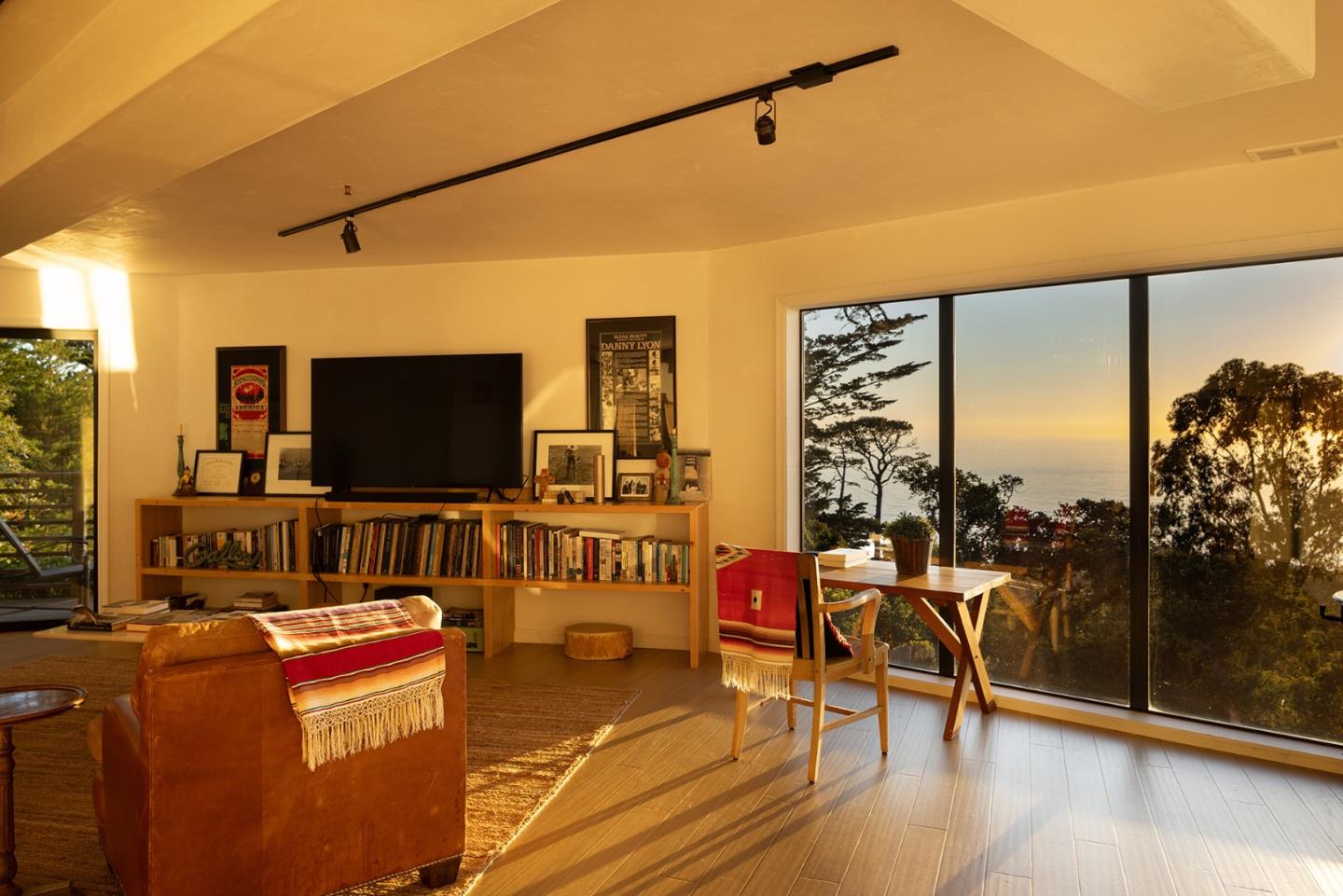 209 Crest Road Carmel, CA 93923 - Photo 19 of 35 a living room with furniture and a flat screen tv