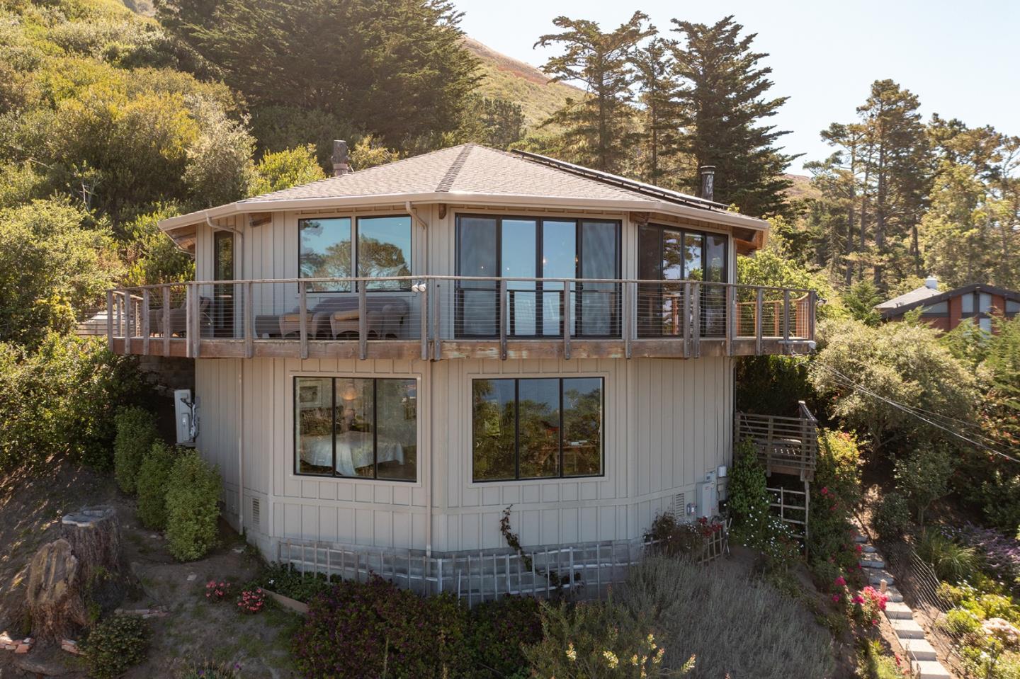 209 Crest Road Carmel, CA 93923 - Photo 23 of 35 a front view of a house with a yard
