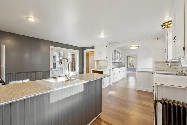 a large room with double vanity sink