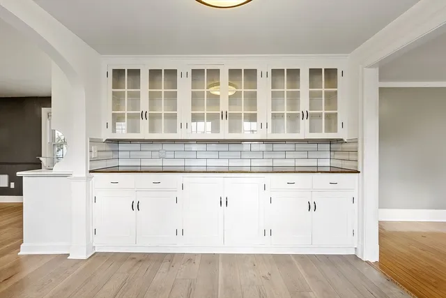an oven with cabinets