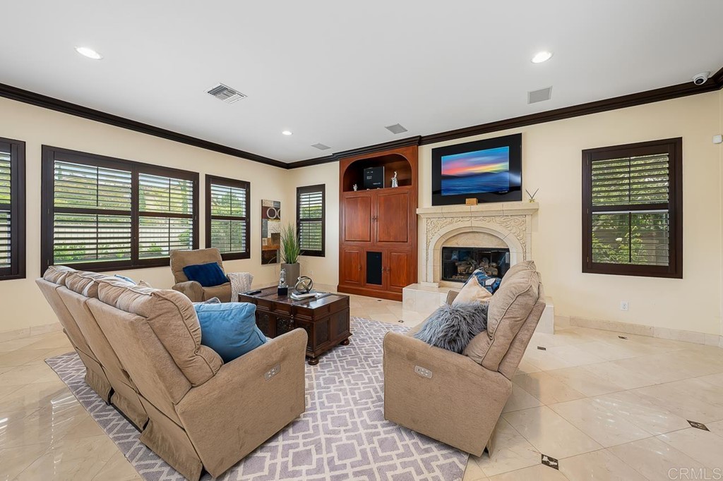 2786 Sutter Ridge Drive Chula Vista, CA 91914 - Photo 19 of 58 a living room with furniture and a fireplace