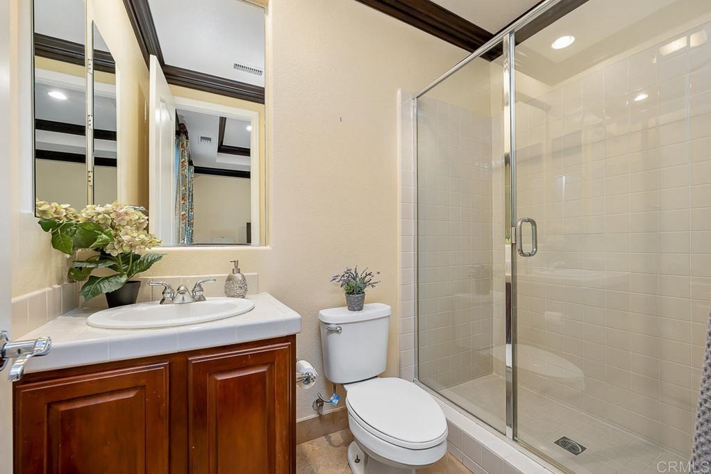 2786 Sutter Ridge Drive Chula Vista, CA 91914 - Photo 24 of 58 a bathroom with a sink toilet and shower