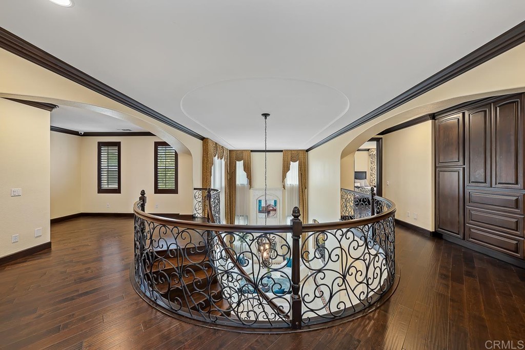 2786 Sutter Ridge Drive Chula Vista, CA 91914 - Photo 35 of 58 a view of a hallway with wooden floor and stairs