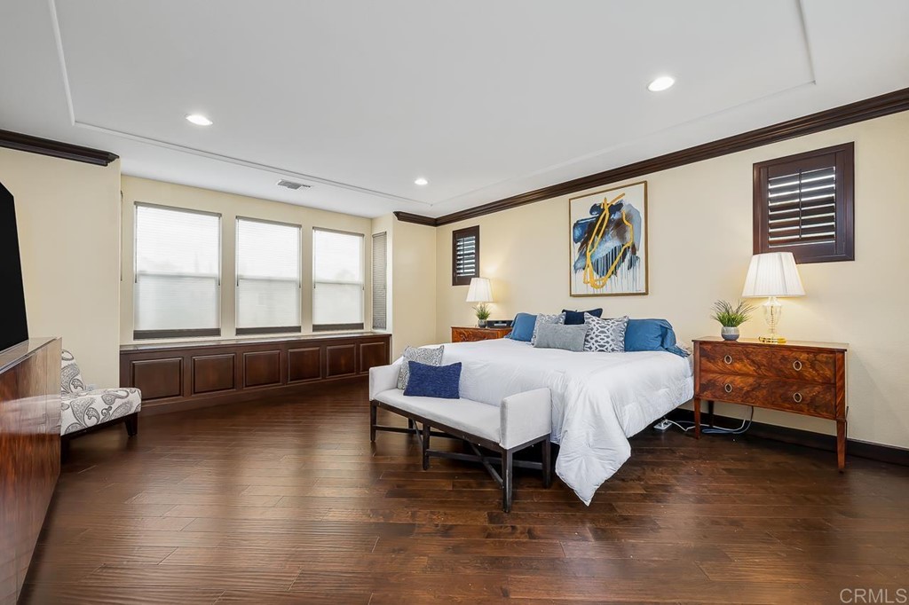 2786 Sutter Ridge Drive Chula Vista, CA 91914 - Photo 36 of 58 a spacious bedroom with a bed and wooden floor