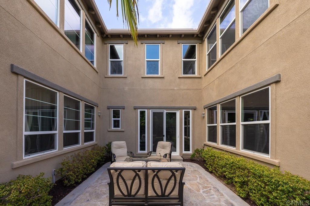 2786 Sutter Ridge Drive Chula Vista, CA 91914 - Photo 49 of 58 a front view of a house with large windows