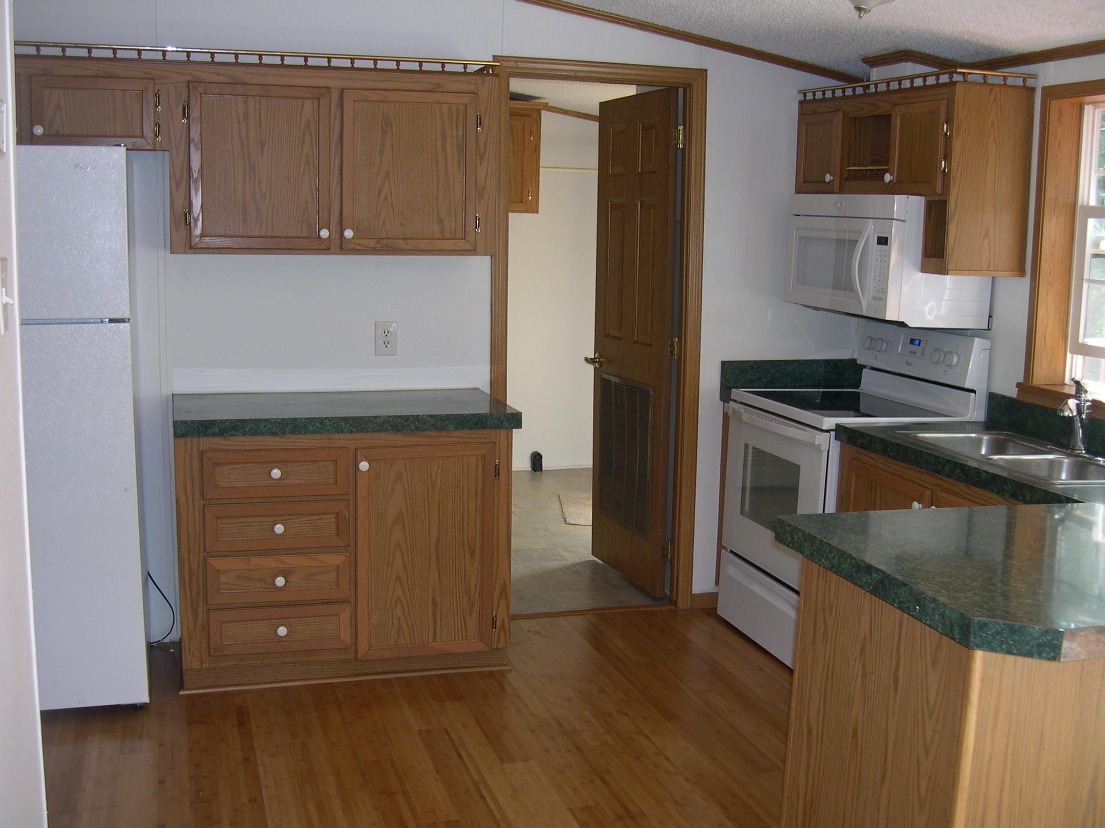 371 Northside Road Newport, VA 24128 - Photo 4 of 5 a kitchen with stainless steel appliances granite countertop a refrigerator and a stove