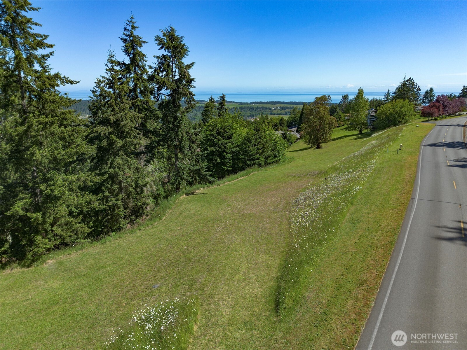 -nka Owls Nest Road Sequim, WA 98382 - Photo 2 of 38 a view of a yard with an outdoor space