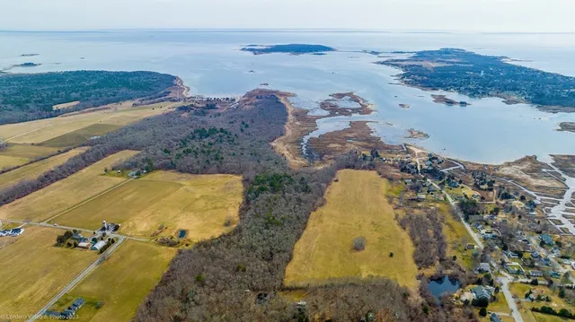 an aerial view of beach and ocean