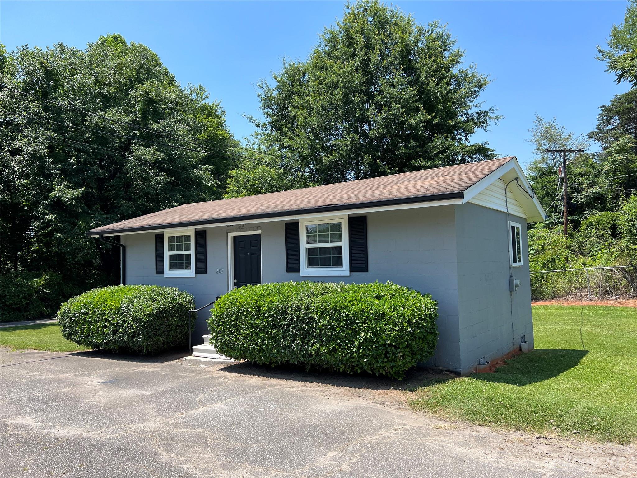 207 Whiteside Road Rutherfordton, NC 28139 - Photo 1 of 24 a view of front of a house with a yard