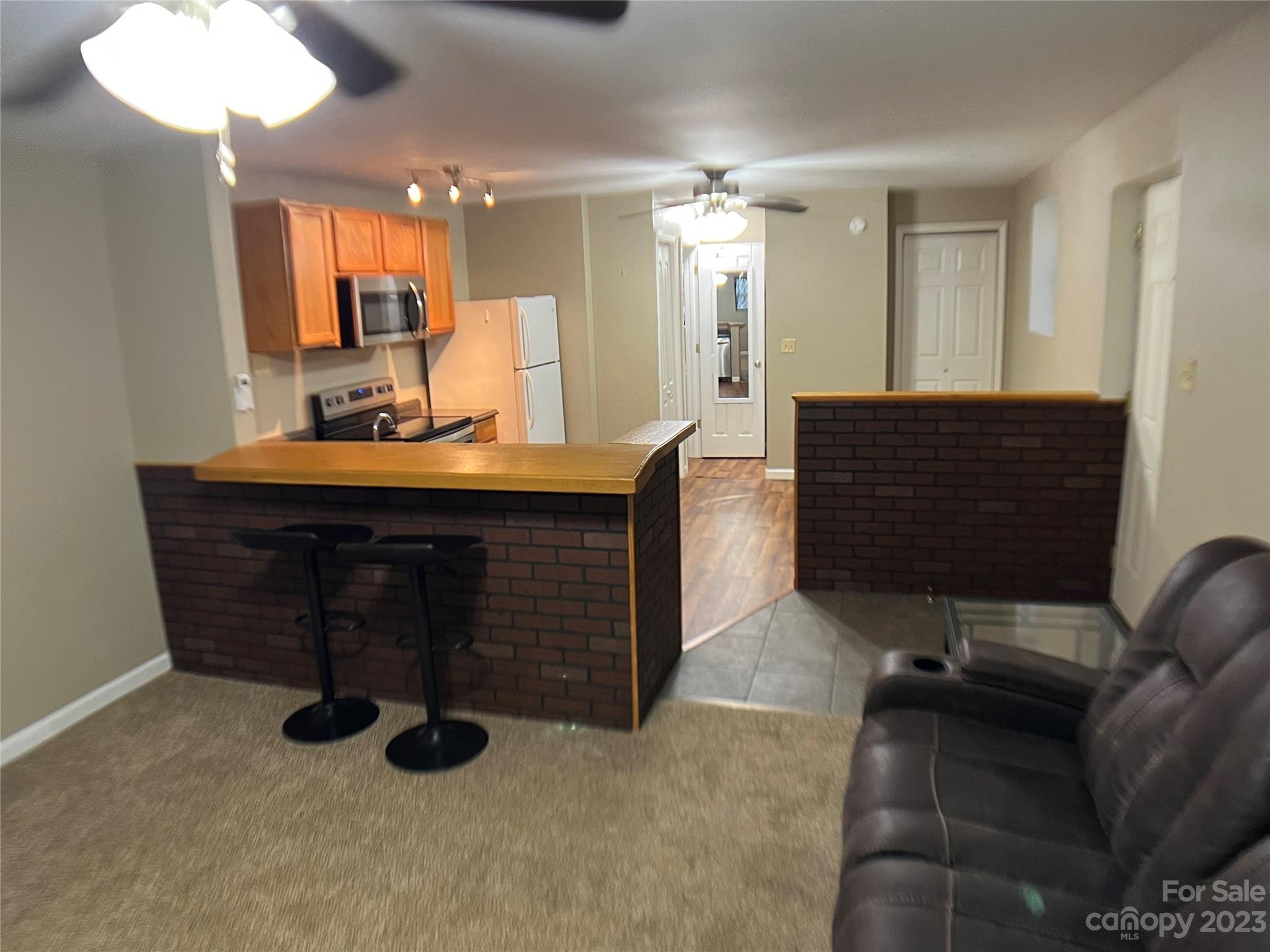 207 Whiteside Road Rutherfordton, NC 28139 - Photo 5 of 24 a room with a table chairs and mirrors