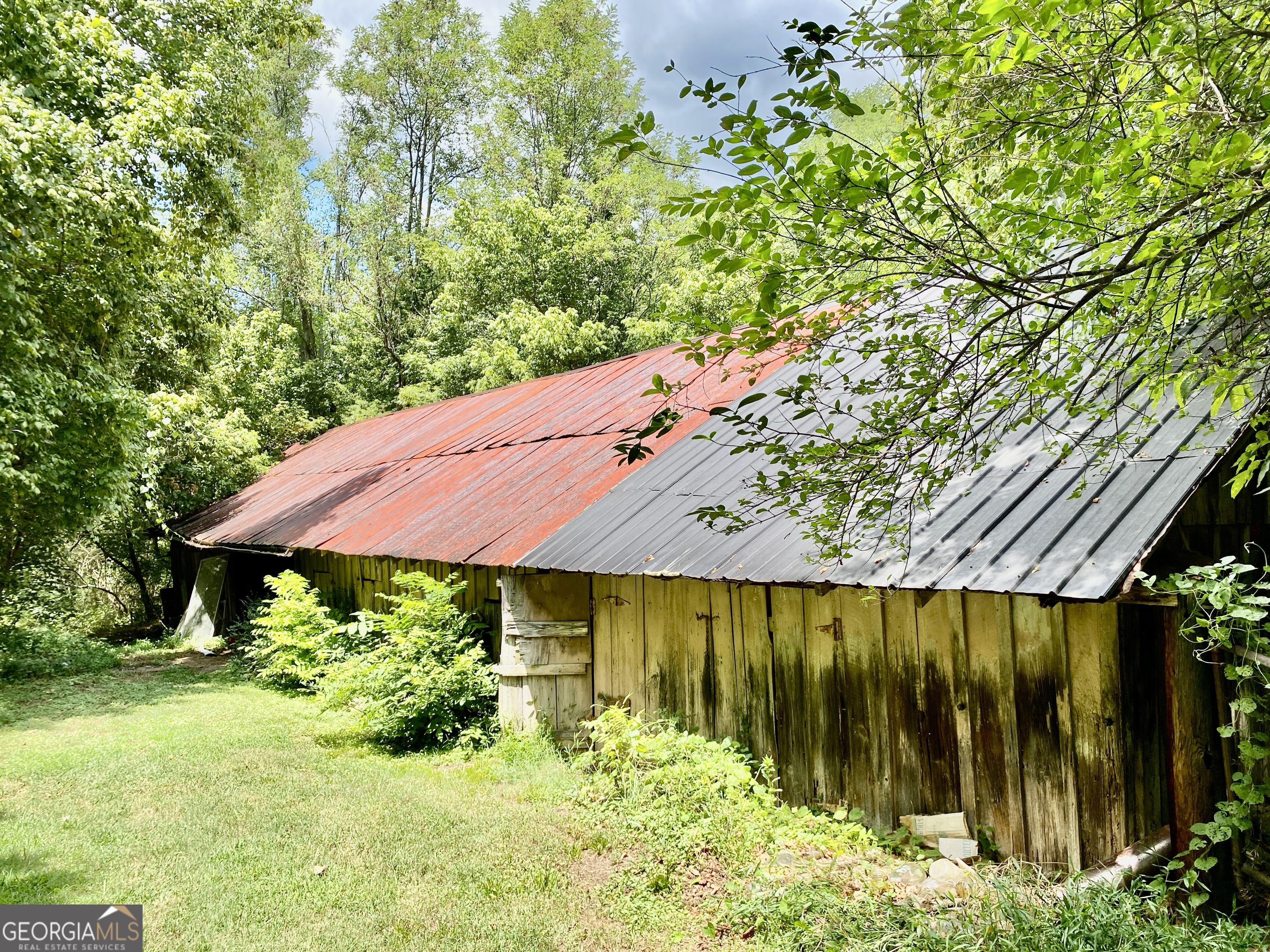 0 Booze Mountain Road Lindale, GA 30147 - Photo 5 of 5 a view of a backyard of a house