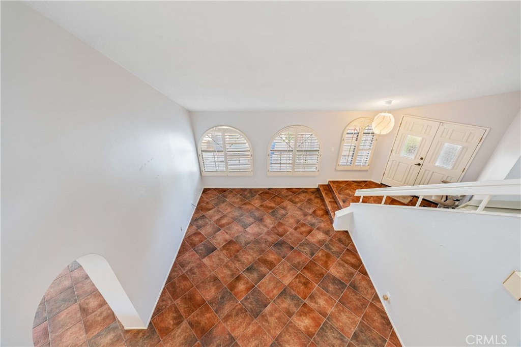 5855 Sunset Ranch Drive Riverside, CA 92506 - Photo 15 of 36 a bedroom with a bed and window