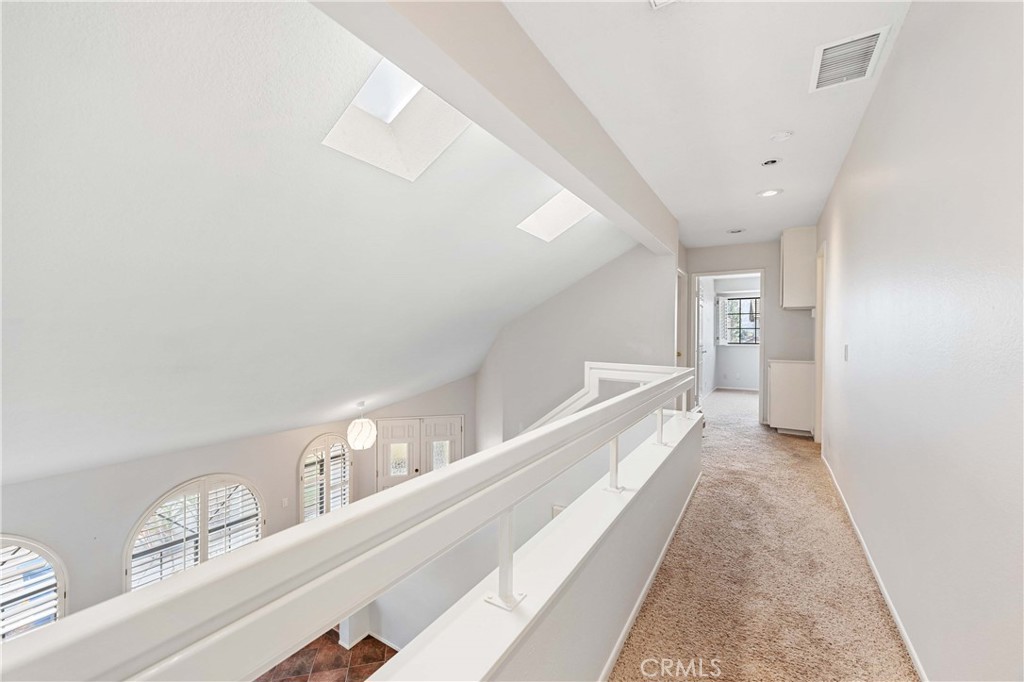 5855 Sunset Ranch Drive Riverside, CA 92506 - Photo 17 of 36 a view of a hallway with windows