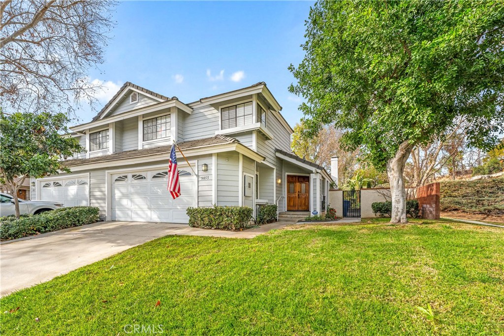 5855 Sunset Ranch Drive Riverside, CA 92506 - Photo 2 of 36 a front view of house with yard and green space