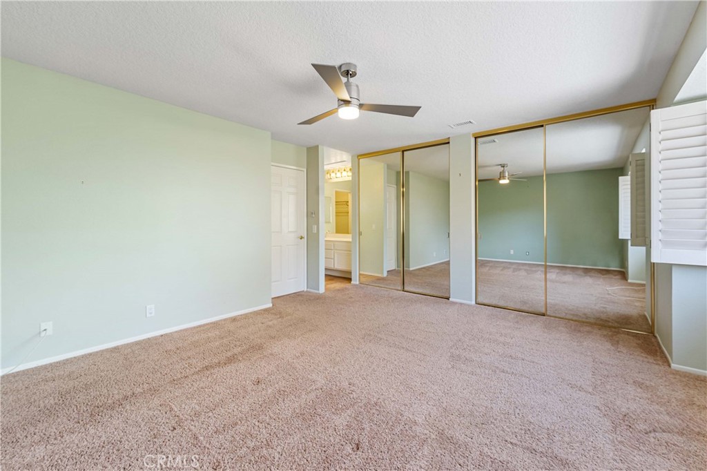 5855 Sunset Ranch Drive Riverside, CA 92506 - Photo 21 of 36 an empty room with a ceiling fan and a shower