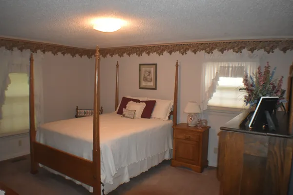 a room with a mirror and a table
