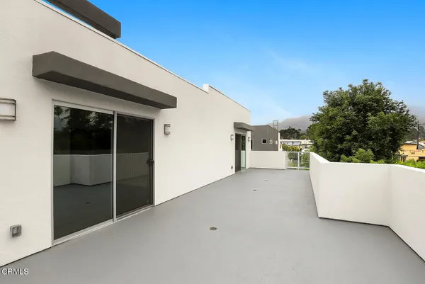 a view of a house with a large window