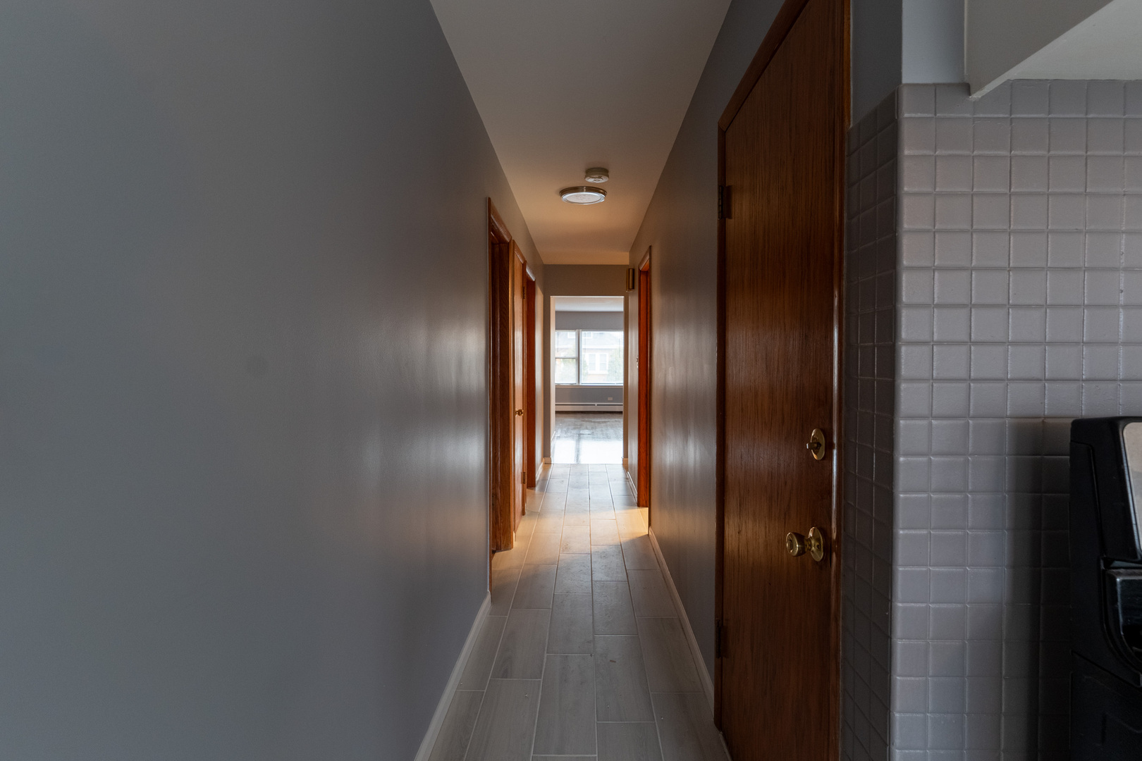 1440 Maple Avenue, Unit 1 Berwyn, IL 60402 - Photo 7 of 23 wooden floor in a gallery