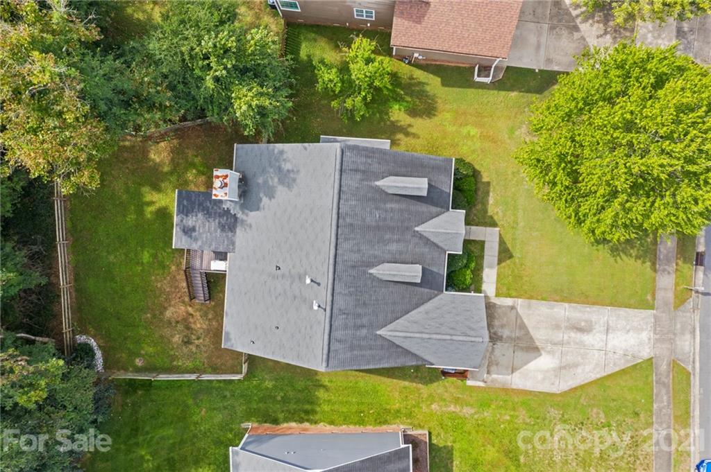 11204 Clayford Ridge Charlotte, NC 28215 - Photo 26 of 37 an aerial view of residential house with outdoor space and swimming pool