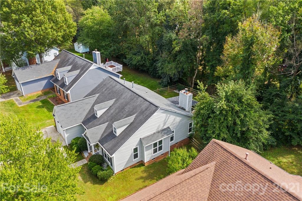 11204 Clayford Ridge Charlotte, NC 28215 - Photo 28 of 37 a aerial view of a house with a yard