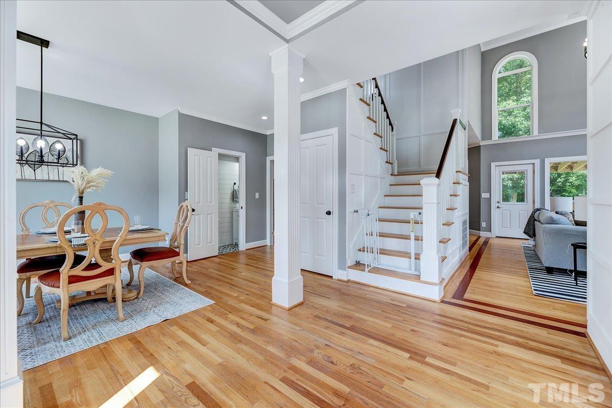 7033 Daniel Road Wake Forest, NC 27587 - Photo 15 of 63 a living room with furniture and wooden floor