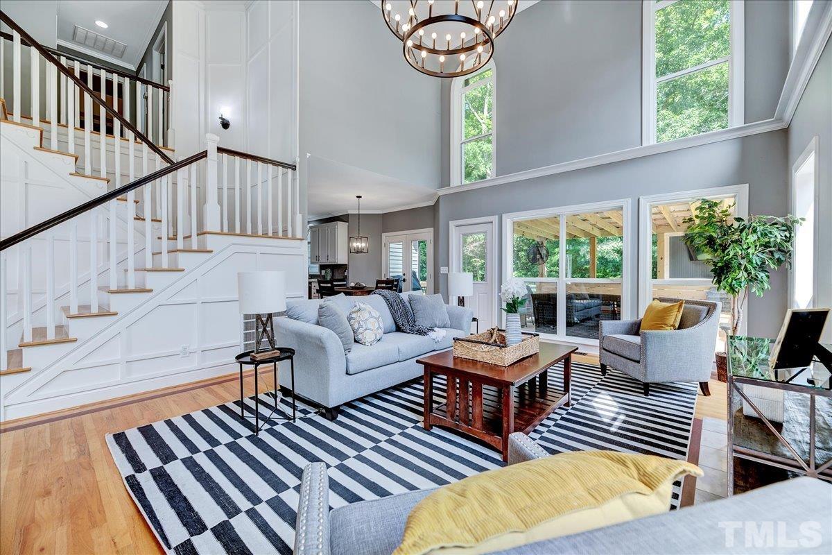 7033 Daniel Road Wake Forest, NC 27587 - Photo 16 of 63 a outdoor living space with furniture and a large window