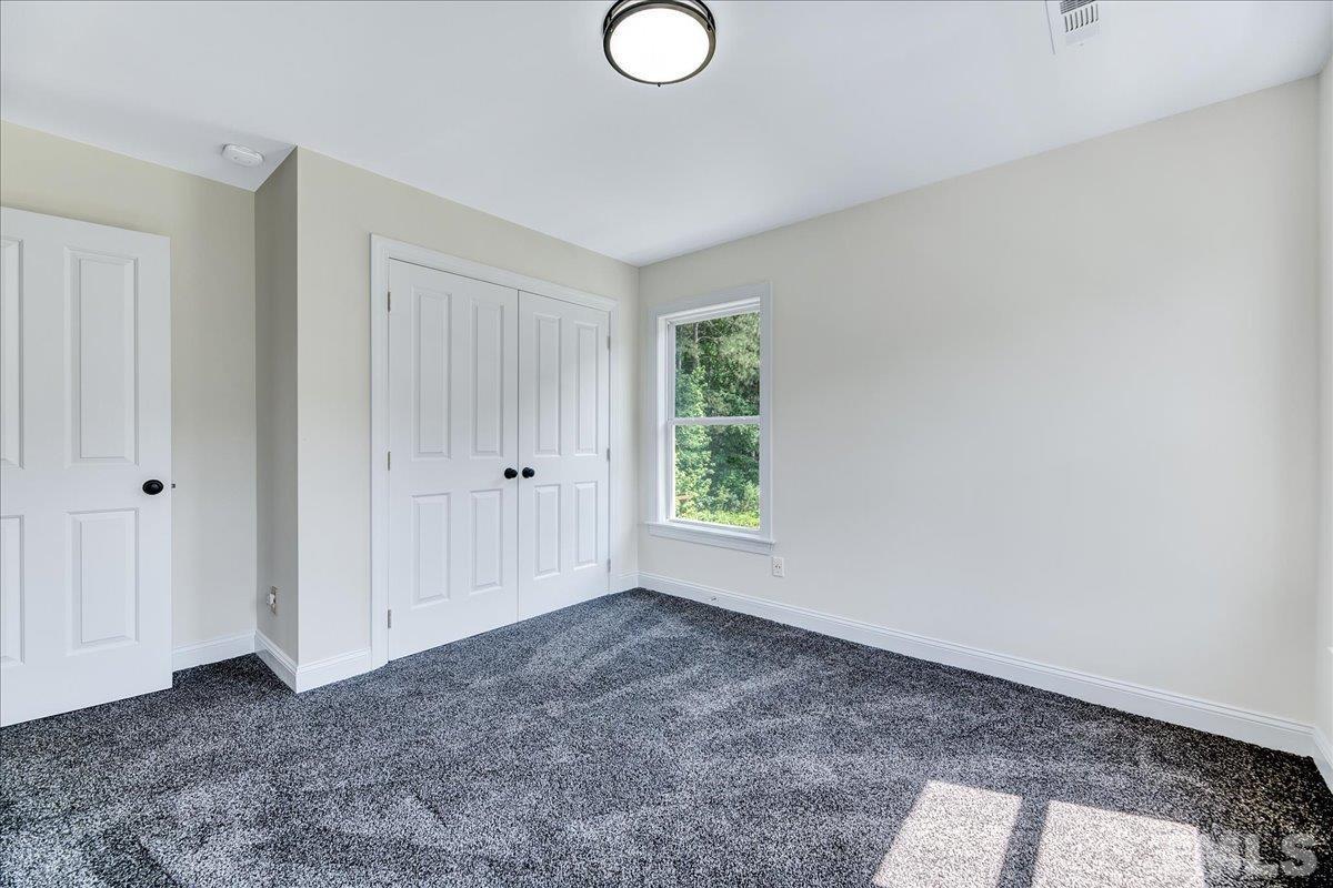 7033 Daniel Road Wake Forest, NC 27587 - Photo 29 of 63 a view of empty room with window