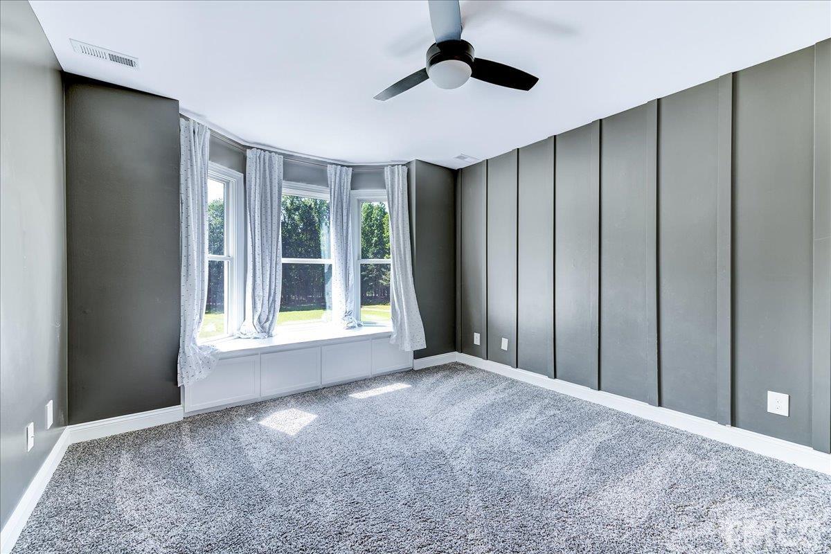 7033 Daniel Road Wake Forest, NC 27587 - Photo 30 of 63 a view of an empty room with a window