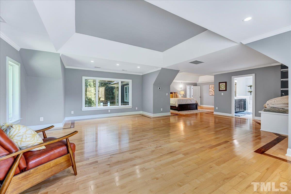 7033 Daniel Road Wake Forest, NC 27587 - Photo 43 of 63 a living room with fireplace furniture and a window