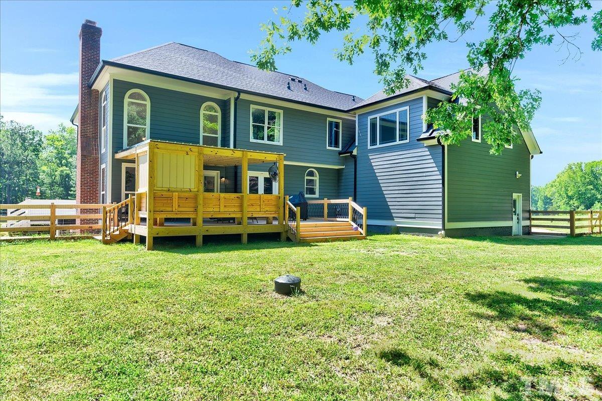 7033 Daniel Road Wake Forest, NC 27587 - Photo 50 of 63 a view of a house with backyard and a tree