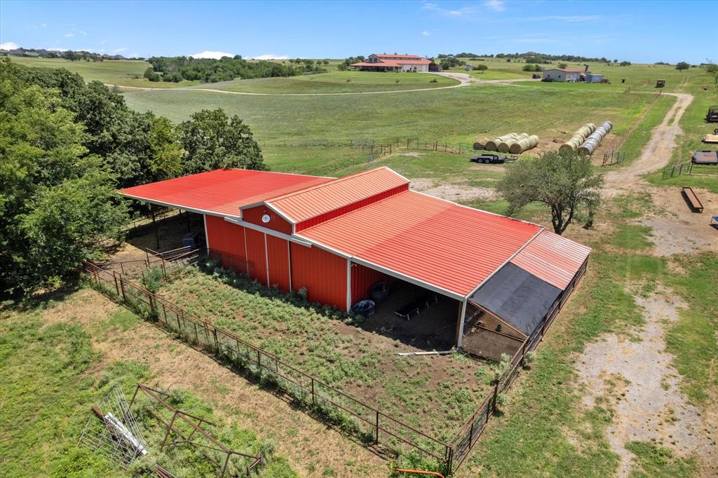 2801 Agnes Circle Springtown, TX 76082 - Photo 11 of 40 an aerial view of a house with a yard and lake view