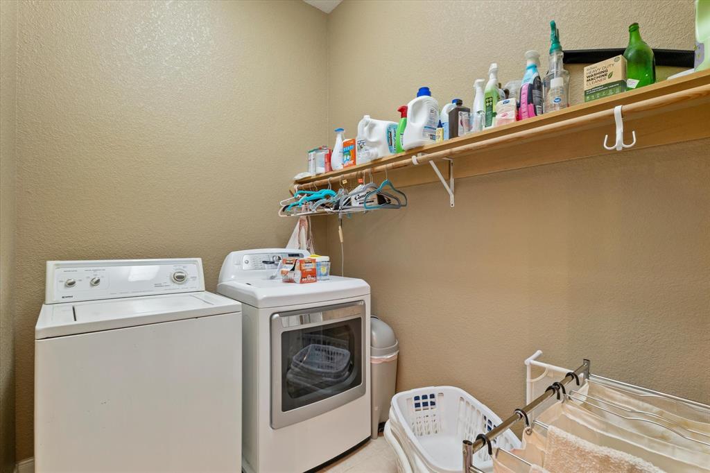 2801 Agnes Circle Springtown, TX 76082 - Photo 25 of 40 a utility room with dryer and washer