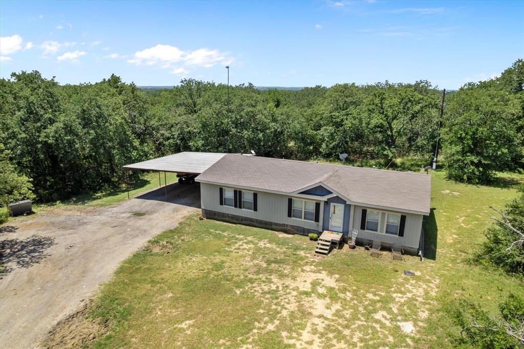 2801 Agnes Circle Springtown, TX 76082 - Photo 39 of 40 a aerial view of a house with a yard