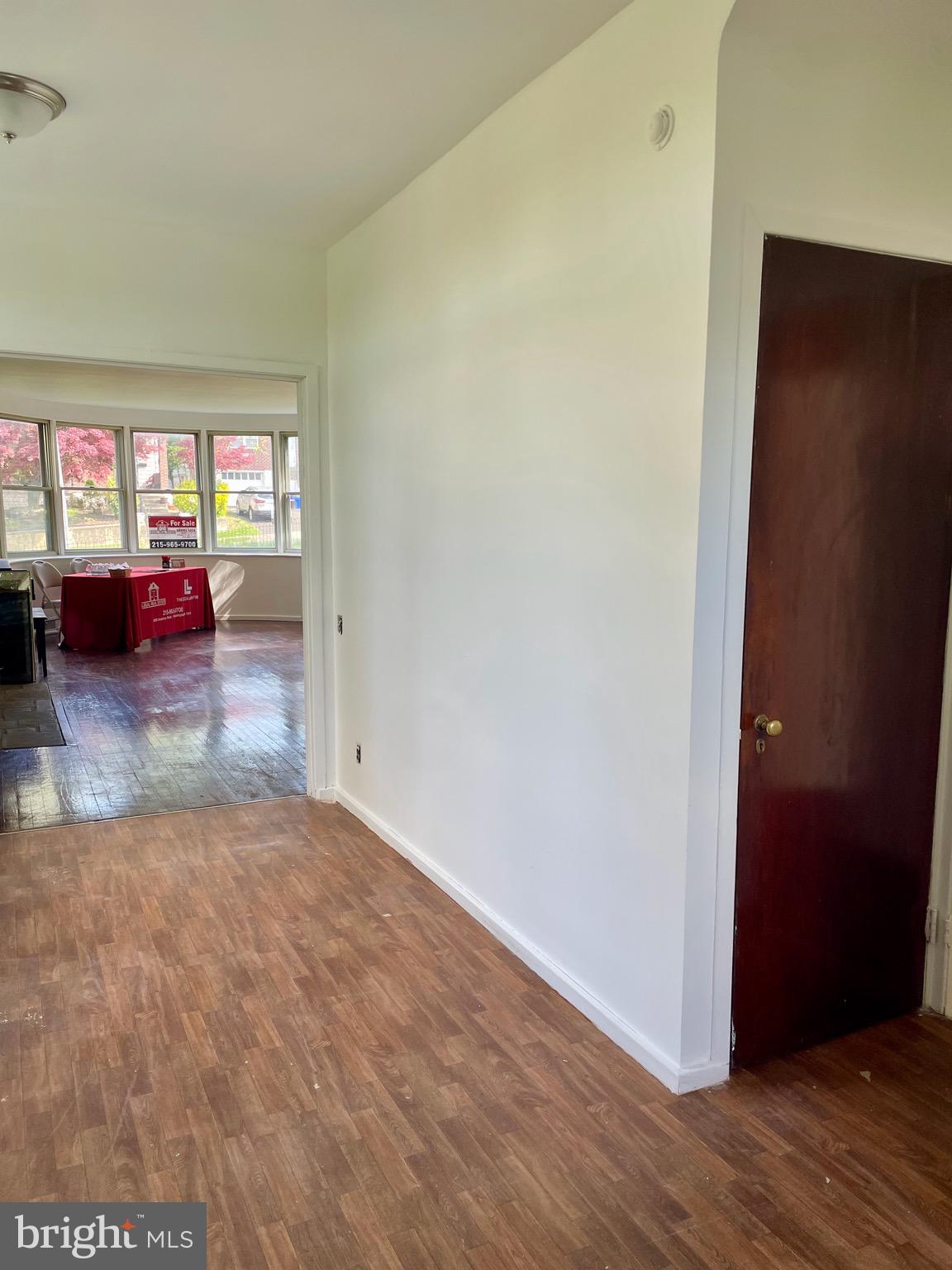 119 Robbins Avenue Jenkintown, PA 19046 - Photo 8 of 65 an empty room with wooden floor and windows